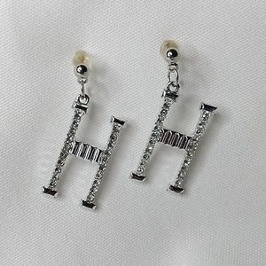 Letter H dangle stud